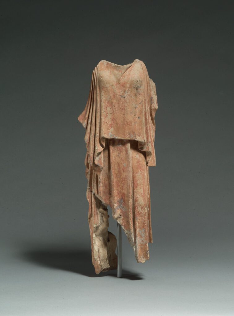 Terracotta figure of a woman; Greek
mid-5th century BCE
On view at The Met Fifth Avenue in Gallery 157
The sculptural type of a woman wearing a peplos becomes prominent during the second quarter of the fifth century B.C., especially in small bronzes. Contemporary works in terracotta on this scale are exceedingly rare. It is possible that this piece served as a model for the preparation of molds from which bronze representations would have been cast.

Public domain data for this object can also be accessed using the Met's Open Access API.