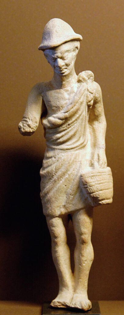 Pileus (römisch)
Griechische Terracotta-Figur eines Bauern mit Pilos, 1., Hut Jahrhundert vor Chr.
Von Marie-Lan Nguyen (3. Januar 2009), CC BY 2.5, https://commons.wikimedia.org/w/index.php?curid=5729364