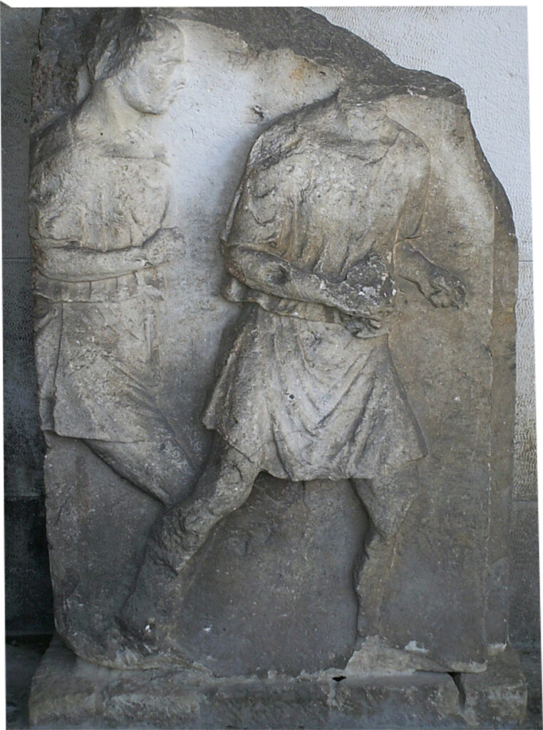 Tunika Roemisch Relief_Tunika_Pula_2011
Römisches Relief in der kroatischen Hafenstadt Pula.
Von Veleius - Eigenes Werk, CC0, https://commons.wikimedia.org/w/index.php?curid=65806608